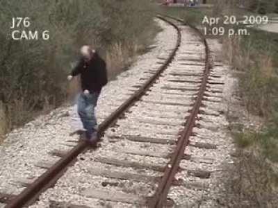 Man gets brutally hit by a train.