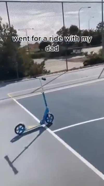Ethan and his dad going for ride in scooters (wholesome)