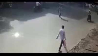 Tackled by a rickshaw.