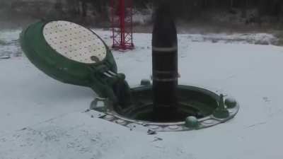 Cold launched three stage solid propellant intercontinental ballistic artificer