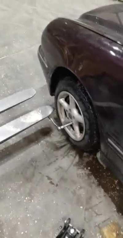 Stuck wheel bolts? Use a forklift.