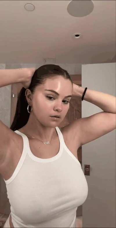 Selena Gomez really loves showing off those massive tits any chance she gets doesn't she
