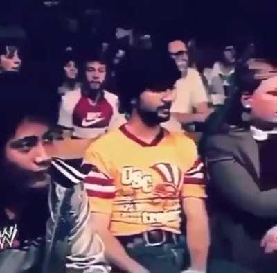 Dwayne Johnson, the Young Rock watching his pops Rocky Johnson as a spectator, 1982.