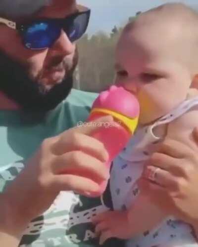 Dad teaching his reflexes to his child