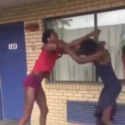 2 women or men almost stripped naked fighting