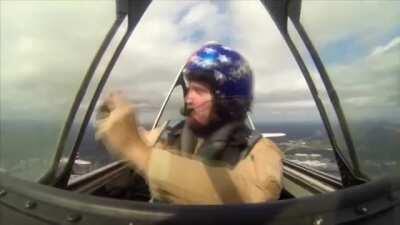 Trying to take a photo in an open-top aircraft