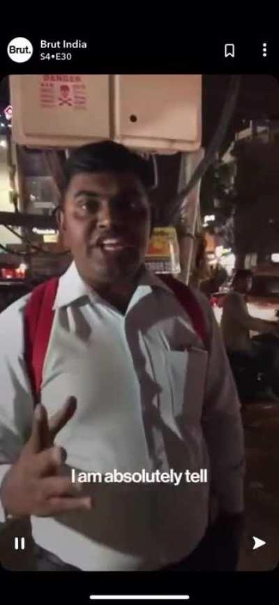 Guy stops a woman riding a motorcycle, tells her to dress properly, and then the guy filming confronts him about it