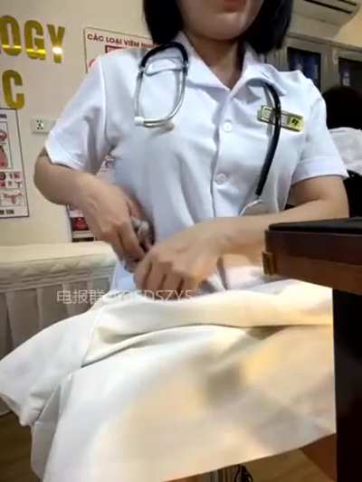 Vietnamese doctor in her shared office