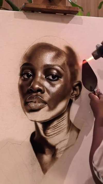 Painting with literal fire on a canvas