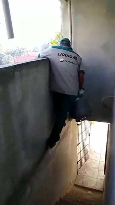 The wonder of Brazilian DIY architecture... P.S No way that guy is paid enough to have to deal with this.