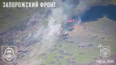 RU pov: Large column of Ukrainian vehicles is destroyed by Russian fire. A BMP with Ukrainian soldiers on top is hit twice. Robotyne area. 