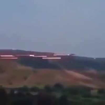 Bunch Of Helicopters Shooting A Target.