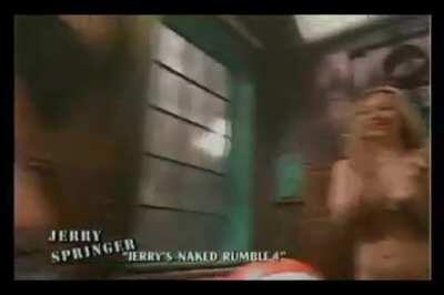 Next Door Nikki bares her big natural tits on a Jerry Springer DVD special.
