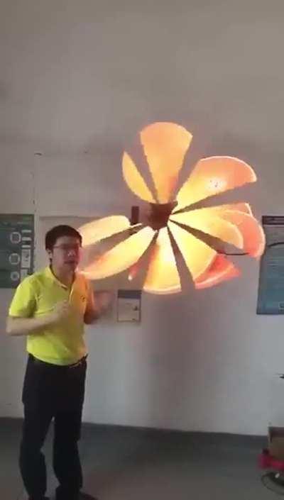 A fan that produces a three-dimensional holographic images