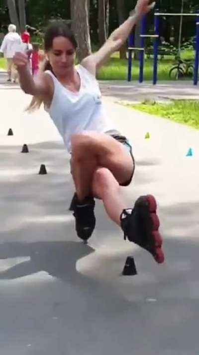 This lady roller-skating backwards…with a twist