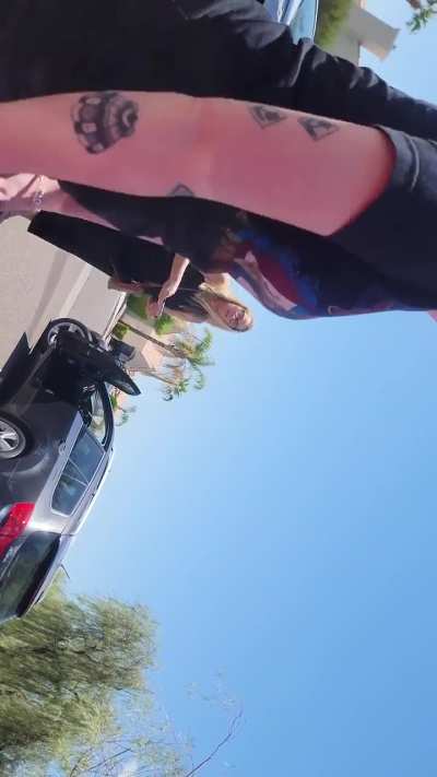 I was leaving a shopping center and she did a u turn legit right in front of a sign that said no u turn's. Then she tossed the trash out of the car, I put the trash back on her car then. The staff came out cause she was screaming at me calling me an abuse