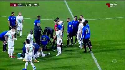 Qatari league player gets a red card in the first minute after kicking his opponent.
