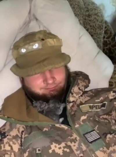 Ukraine Defender's with their furry cat volunteers. 