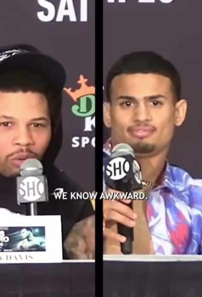 The face of boxing maintains cool calm alpha composure as his opponent babbles on 