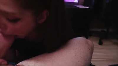 Redheaded slut sucking cock