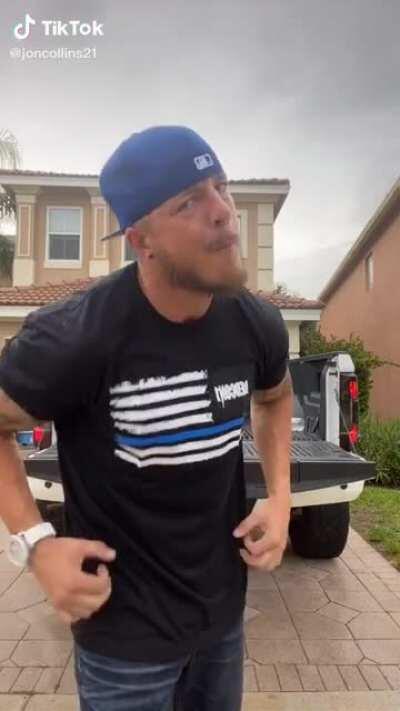 The face or the pose or the shirt or the truck I don't know but it's not good