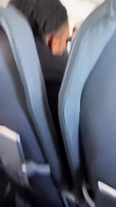 Flight to Phoenix is diverted to Denver because a guy keeps flicking his lighter and won't give it up