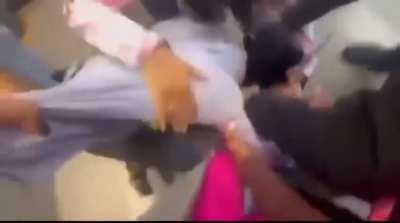 Girls fight in the hallway 