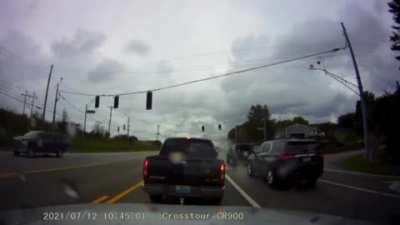 Okay who is at fault here? The truck or the dash cammer? Speed limit is 55 there is a green light and cammer was following at 2 plus car lengths