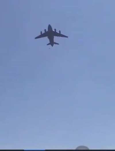 Insane footage of people falling off the side of military planes