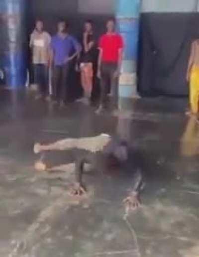 This man is cracking his back.