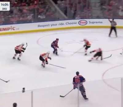 Connor McDavid ridiculous backhand spin-o-rama between two Flyers
