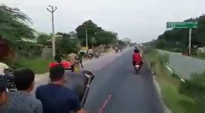 Racing on road in a Bullock cart