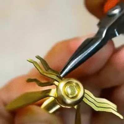 Guy makes wasp out of screws