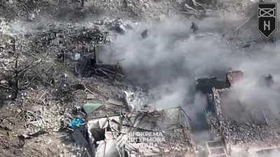 Ukrainian drone captures the moment Russian artillery shell lands near Ukrainian troops whom are taking Russian soldiers prisoner in Andriivka full footage (posted by 3rd Assault Brigade)