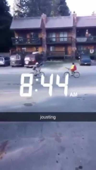 Jousting with oars on bicycles