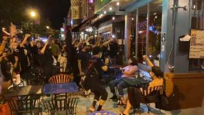 To get a woman to raise her fist