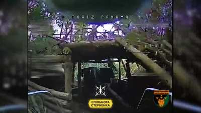 Ukrainian FPV pilots attack a hidden Russian towed howitzer with fiber optic UAVs. Bryansk Oblast.