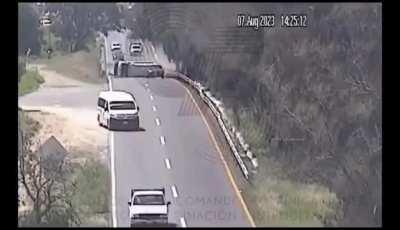 Van goes flying and lands on its side