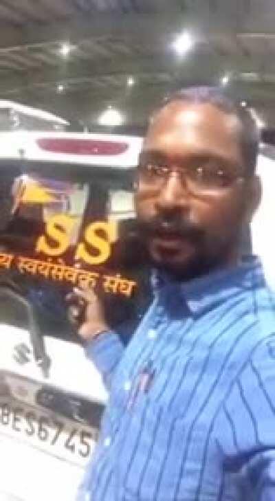 Car with RSS sticker is not being allowed onto the Tirupati hills.