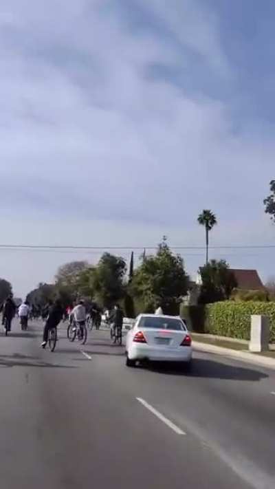 White Mercedes vs Bikers