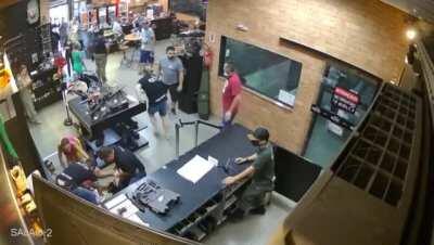 Man accidentally shoots his buddy in the stomach.