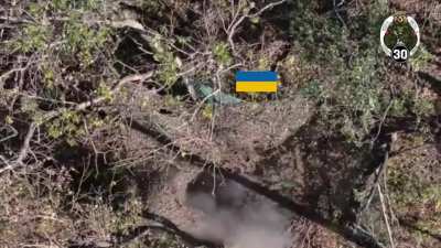 Drone operators of the 30th Brigade use VOG airdrops on a pair of UAF soldiers hiding under a camouflaged position in the Pokrovsk direction