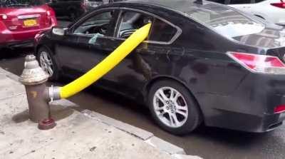 Car parked in front of fire hydrant.