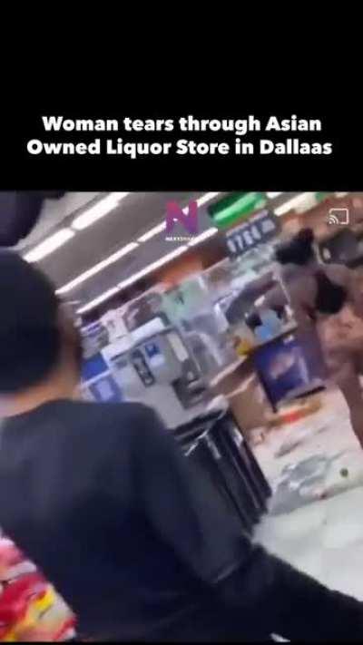 Woman destroying stuff in a store