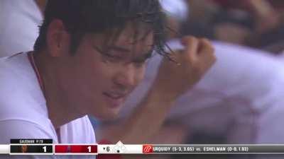 Shohei Ohtani soaking wet and smiling.