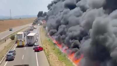 In Spain, an oil tanker leaked and then caught fire.