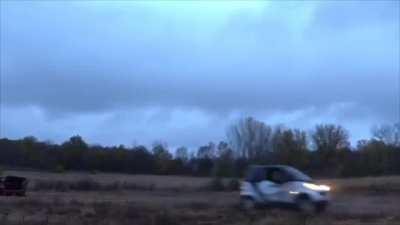 Pulling a smart car out of the mud