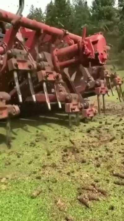 Golf course aeration is preventive maintenance but looks like it’s straight out of a nightmare