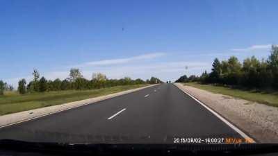 car looses control and crashes into truck. all occupants of the car died instantly.