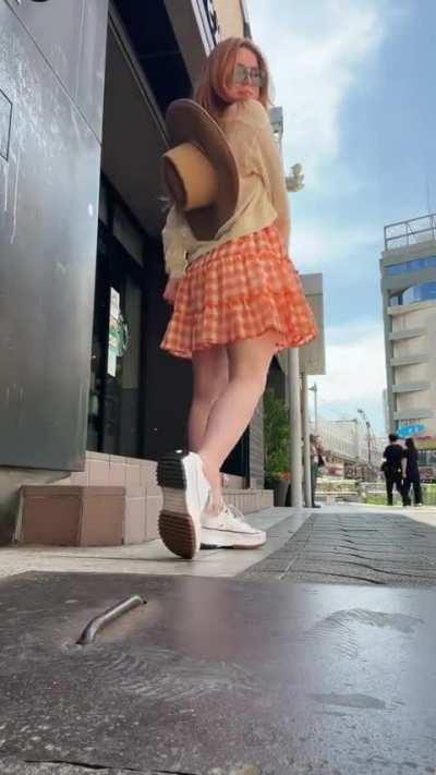 Doing a twirl & showing off her legs in Japan (April 2023)